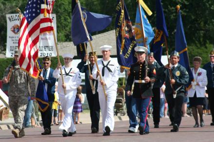 Ness County Old Settlers' Reunion Parade, lead by hometown heroes